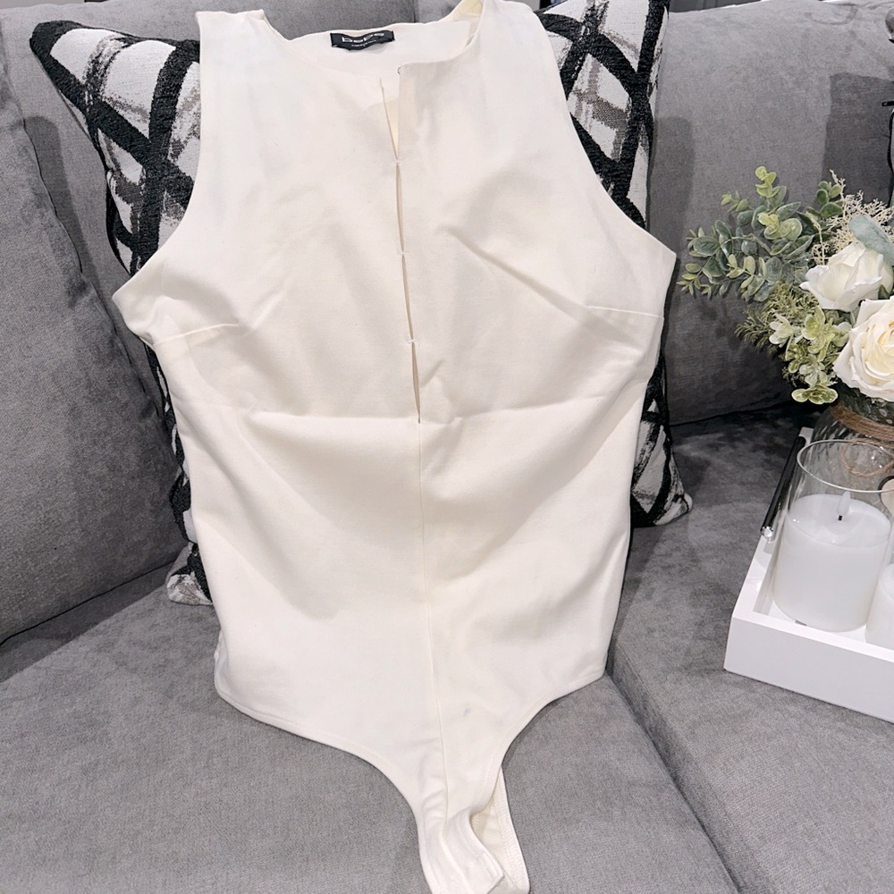 Bebe Cream bodysuit with a touch of stretch size L
